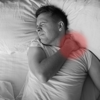 man showing neck pain after sleep