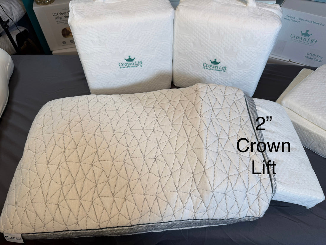 Three foam wedges with a 2-inch measurement label, used for neck support. crown lift insert 2" The two inch crown lift is designed to hold and cradle the head. it does allow the head to sit in a cradle without the sink from traditional pillows that claim to cradle head. The two inch can be used directly inside pillowcase or burrowed into the pillow fill tocreate the cradle effect down inside without the head sink