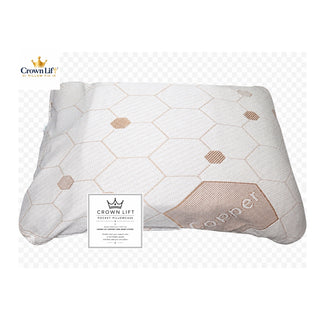 A Crown Lift Memory Pillow in copper, featuring a white and copper hexagonal honeycomb pattern, shown on a white background with a transparent checkered pattern. The copper infused pocket pillowcase is an easy upgrade and customer's love the feel and cooling effects.