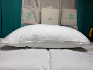 Sanctuary Sleep Crown Lift® Pillow Fix adjustable neck support pillow insert shown on side of a pillow for better comfort.