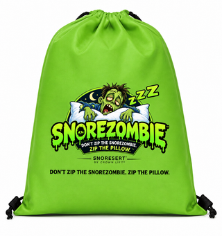 A bright lime green drawstring bag featuring a cartoon zombie sleeping with its pillow untied, with the text 'Snoarezombie' and 'Don't zip the snoresleep, zip the pillow.' printed on the front.